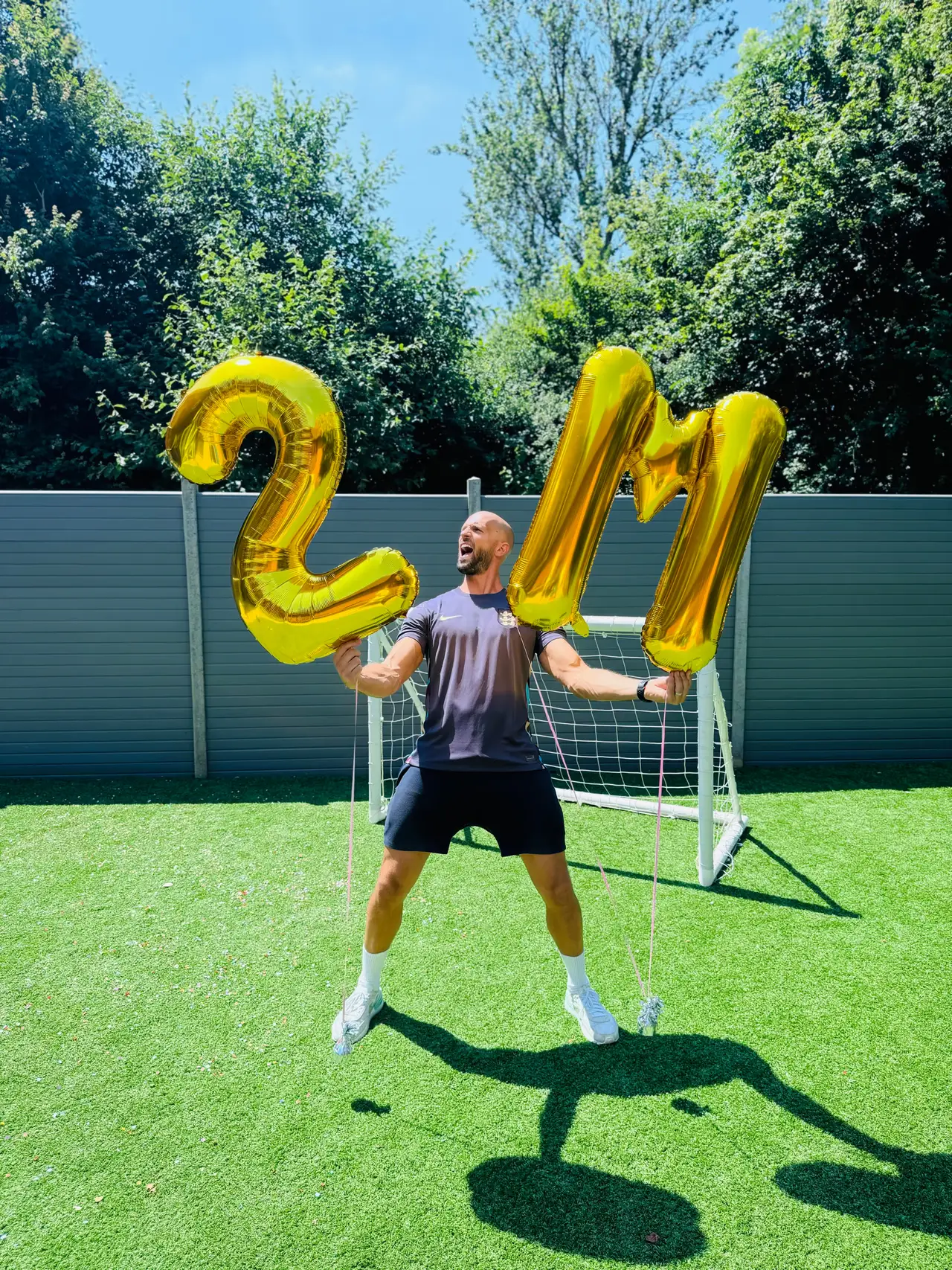 Daniel at a party, with 2M balloons