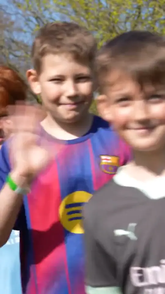 Campers celebrating at a football camp